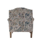 Fauteuil rembourré en bois avec motif floral, accoudoirs à panneaux et dossier en forme de bosse de chameau.