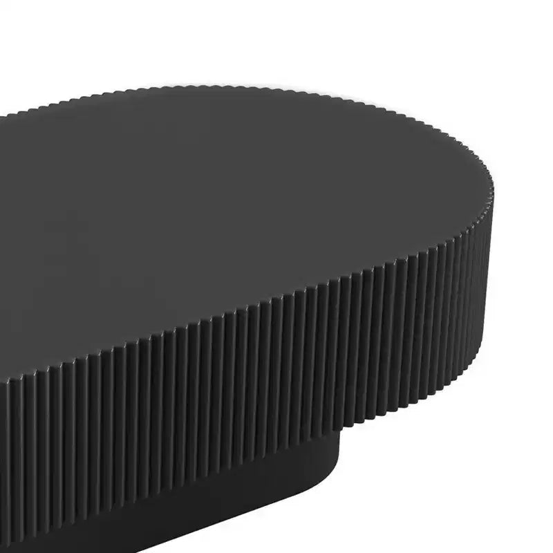 Table basse ovale avec piètement cannelé pour le salon