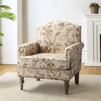 Fauteuil rembourré en bois avec motif floral, accoudoirs à panneaux et dossier en forme de bosse de chameau.